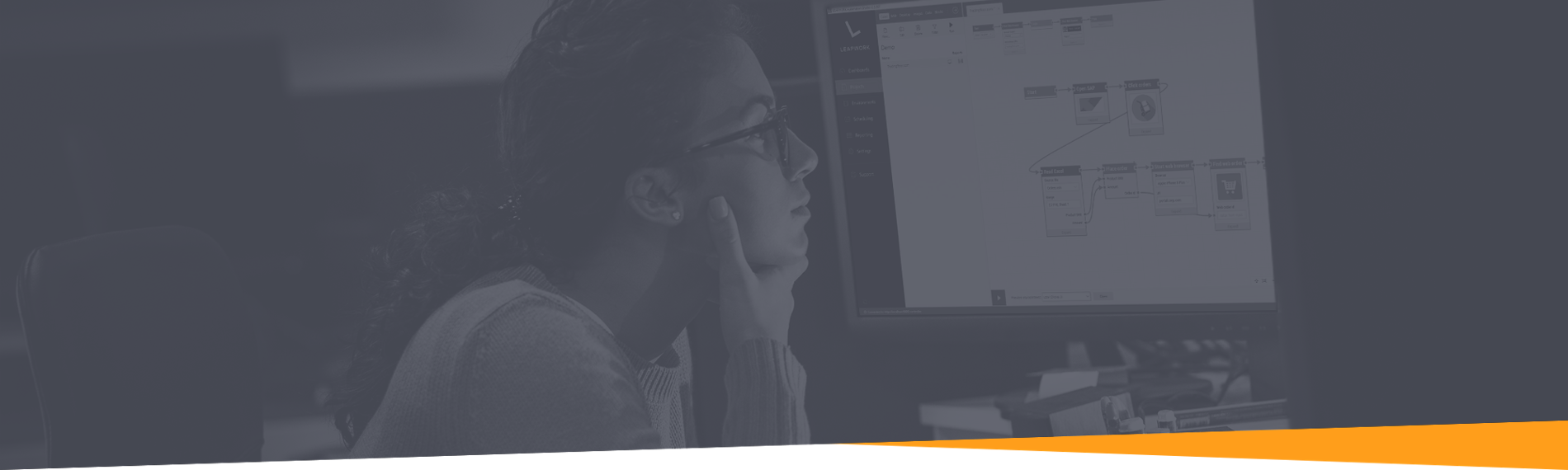 Banner image showing LEAPWORK user working.
